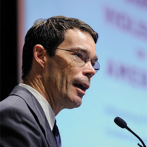 Image of man at microphone