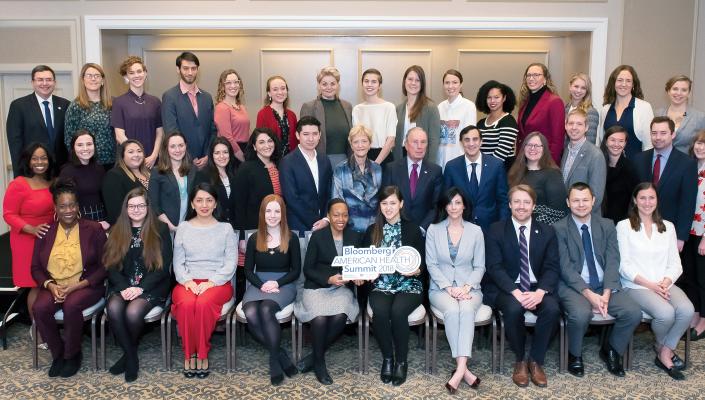 Image of BloombergFellows with Dean MacKenzie & President Daniels