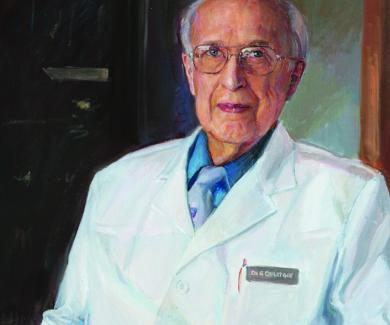 Painting of George Comstock, seated, wearing a lab coat