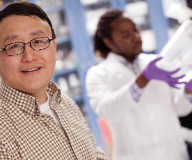 Xiao-Fang Yu in his laboratory