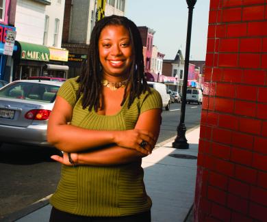 Tiffany Gary stands on a Baltimore street