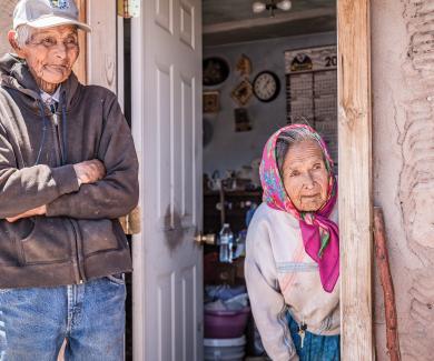 delivering a “family box” of food, soap, and other essentials on May 25 to Gene and Bertha Mitchell, a Navajo couple in Chinle Valley, Arizona