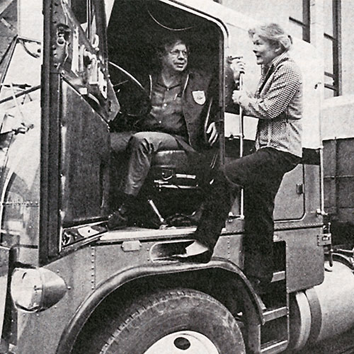 Sue Baker talking to a Maryland truck driver after she drove an 18-wheeler at GM proving ground